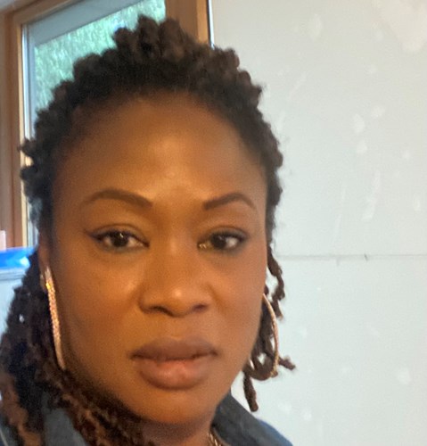 Black woman looking at the camera