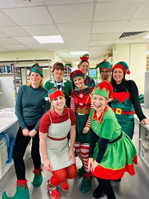 A group of women wearing elf outfits.