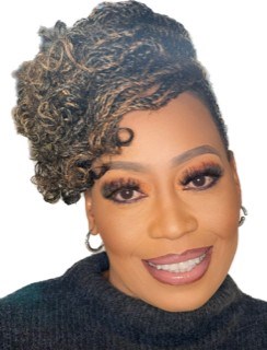 Sipo Mabena smiling at the camera