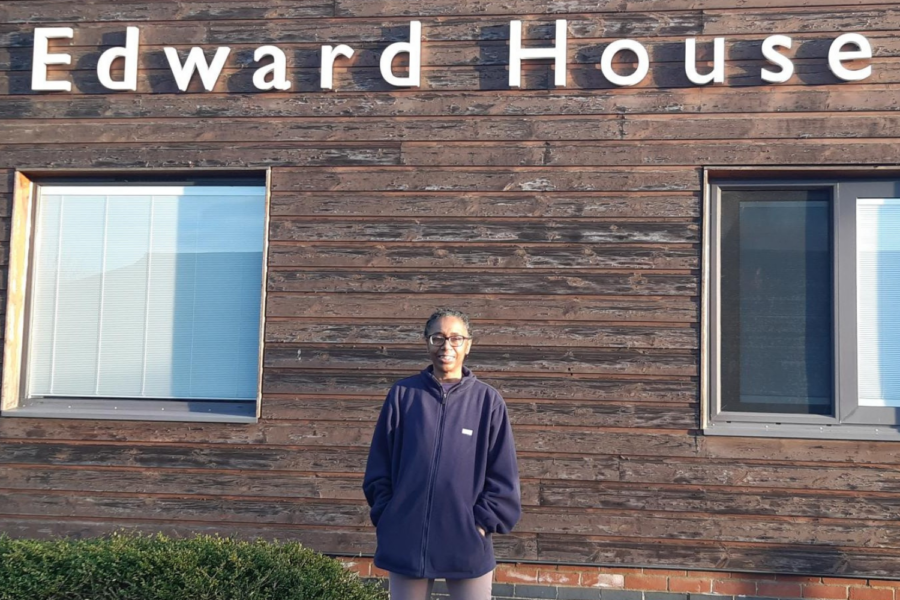 Peer worker Rosealine standing outside Edward House